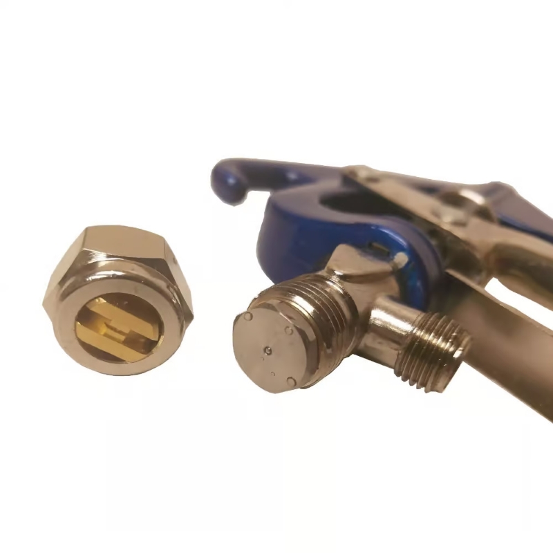 23L-B canister spray gun nozzle with the spray tip cap removed, showing the brass flat fan tip insert