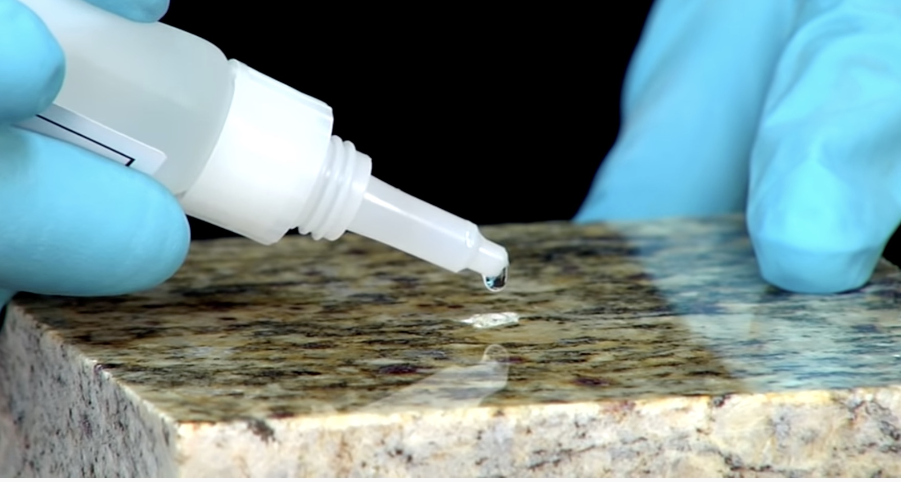 Stone chip repair kit applied to granite countertop