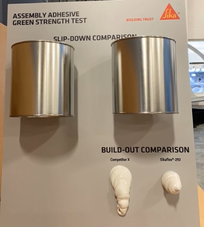 Sika green strength test board with slip-down and build-out comparisons of Sikaflex 292 and Competitor X beads