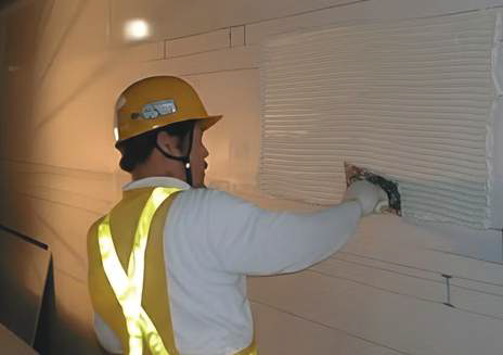 Applying Tile Ace Max with a notched trowel