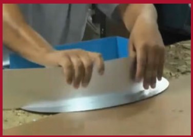 Cutting and bending aluminum coil into a reverse channel letter return